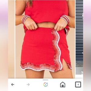 Two piece Queen of Sparkles, red skirt with matching top.  Only worn once